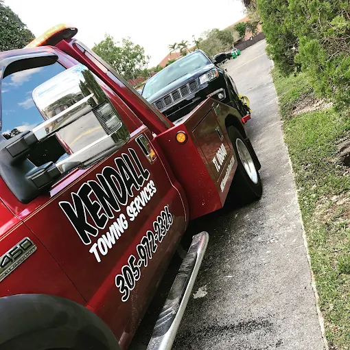 Kendall Towing Services tow truck on a Miami-Dade street